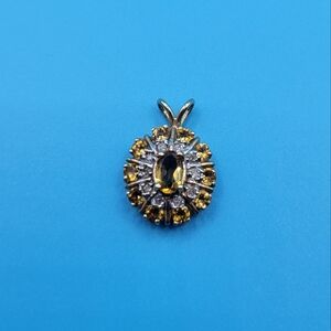Vintage 10K Yellow gold Small Orange Tanzanite and Diamond Oval Pendant
